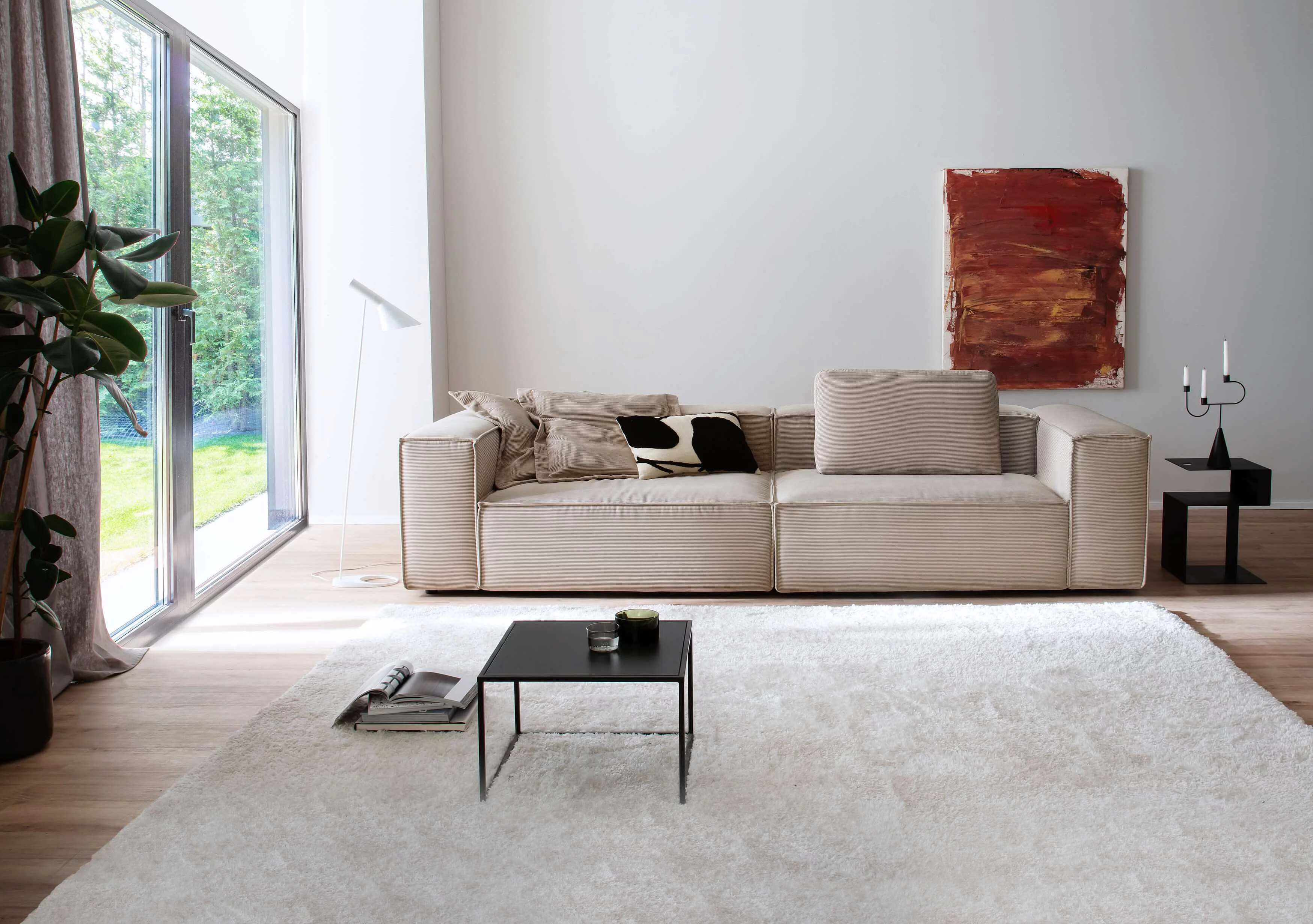 Watertown single sofa upholstered in fine corduroy in the colour sand in a cosy atmosphere