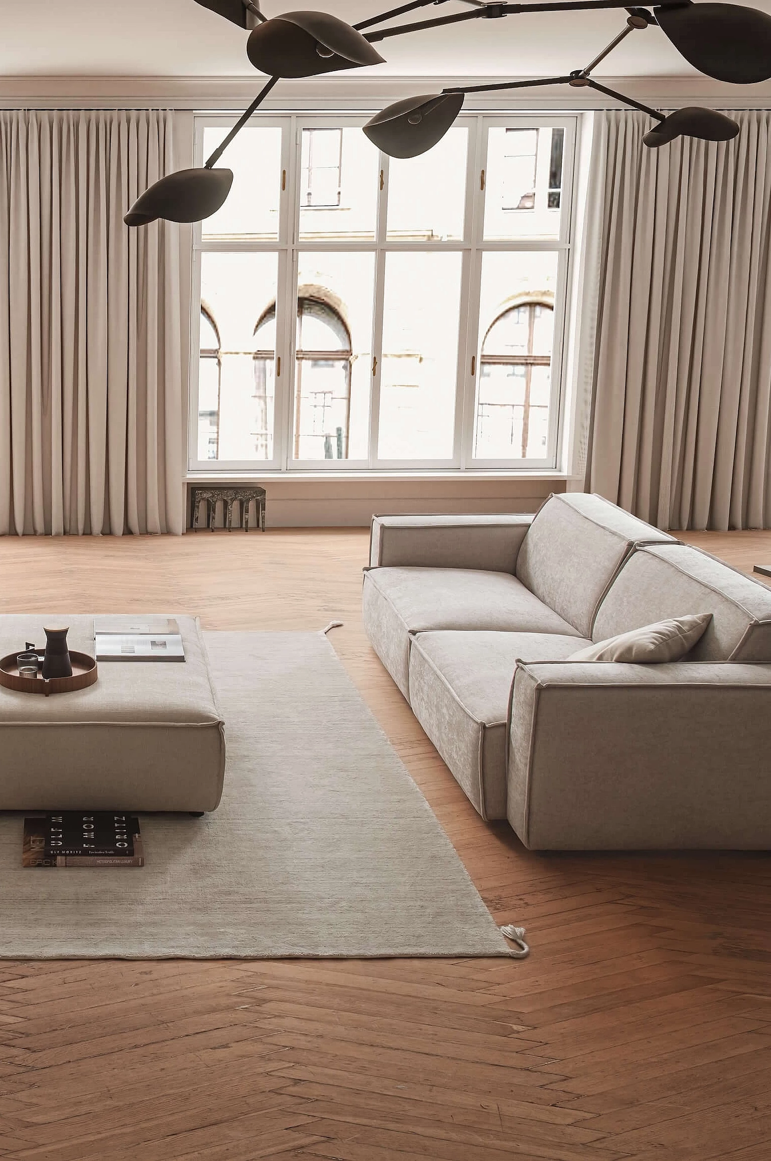Upper East Single sofa with stool, upholstered in yelda fabric in the colour nature in a cosy atmosphere