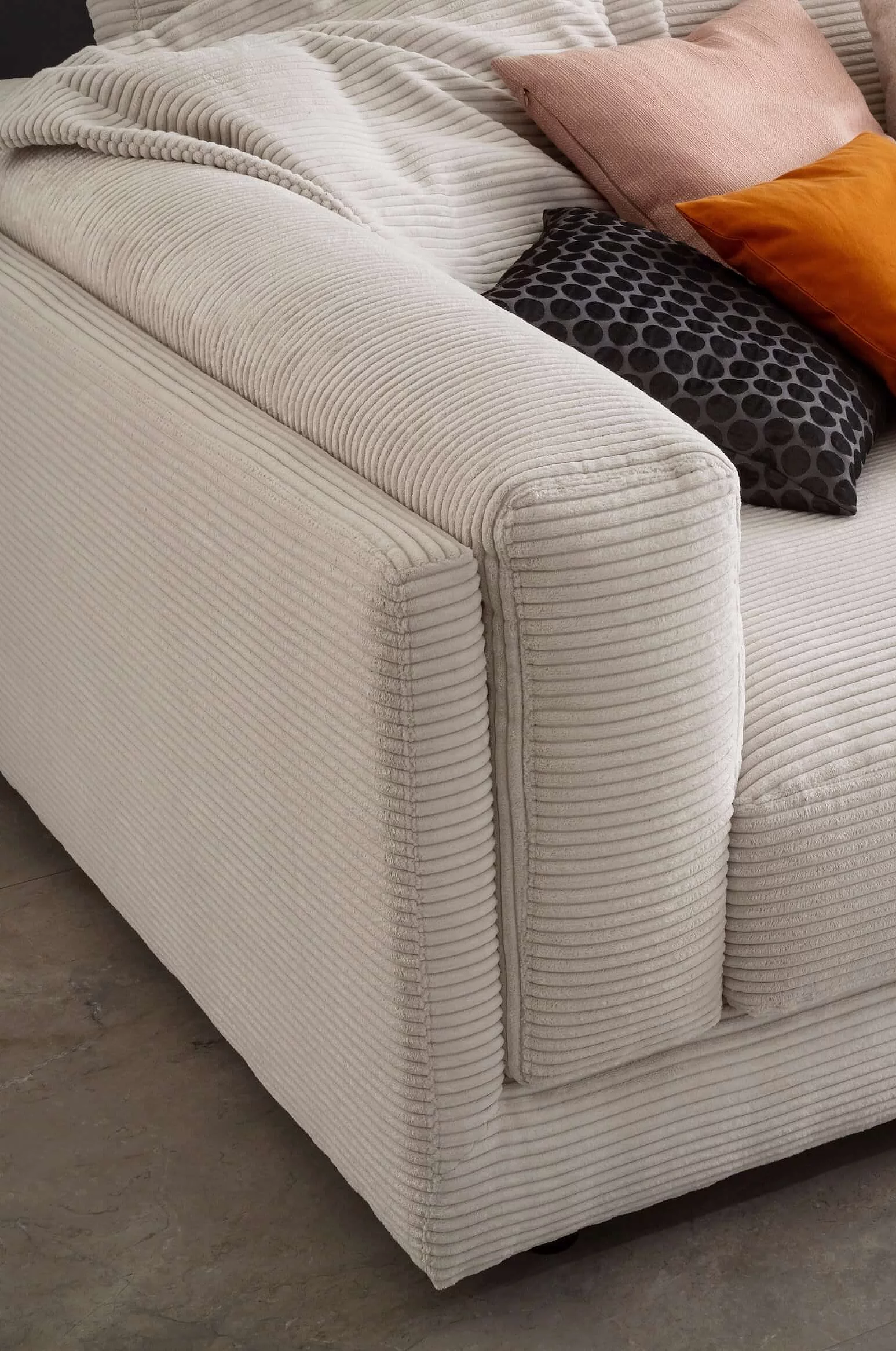 King Size oversized sofa with corduroy upholstery in the colour Snow, close-up