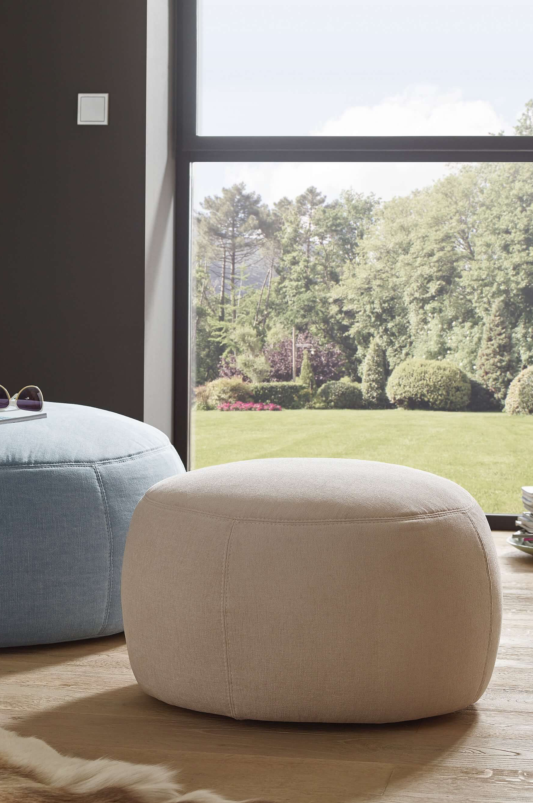 Aiken pouf with Easy-Care upholstery in White in a cosy atmosphere